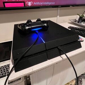 Selling My PS4 - Well-Maintained, Priced to Go!